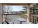 Balcony view overlooking a serene lake, perfect for relaxation and enjoying nature at 1057 Timber Creek Dr # 12, Carmel, IN 46032