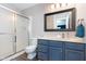 This bathroom features a step-in shower and a gray vanity with ample countertop space at 1057 Timber Creek Dr # 12, Carmel, IN 46032