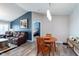 Inviting living room featuring a leather sofa, dining table and decor at 1057 Timber Creek Dr # 12, Carmel, IN 46032