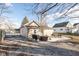 Cozy backyard featuring a patio with a hot tub and seating area, perfect for outdoor relaxation and entertaining at 108 N Maple St, Pittsboro, IN 46167