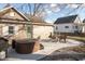 Backyard featuring a patio, hot tub, and outdoor seating at 108 N Maple St, Pittsboro, IN 46167