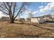 Backyard featuring a large shed on a spacious lawn at 108 N Maple St, Pittsboro, IN 46167