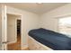 Bedroom with a large bed and a window to let in natural light at 108 N Maple St, Pittsboro, IN 46167