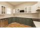 Modern kitchen featuring sleek countertops, stainless steel appliances, and well-organized storage, perfect for culinary enthusiasts at 108 N Maple St, Pittsboro, IN 46167