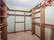 Spacious walk-in closet with custom shelving and ample storage space at 10831 Canoe Ct, Indianapolis, IN 46236