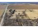 Aerial view of a farmhouse, a barn, and some fields in a rural setting at 1125 S Buffalo Hill Rd, Martinsville, IN 46151