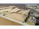 Panoramic aerial view of a rural property with houses, fields and trees at 1125 S Buffalo Hill Rd, Martinsville, IN 46151