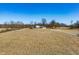 Scenic aerial view of a home with a long driveway and a verdant landscape at 1125 S Buffalo Hill Rd, Martinsville, IN 46151