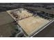 Aerial view of property boundaries outlining land with buildings, road access, and trees at 1125 S Buffalo Hill Rd, Martinsville, IN 46151