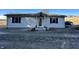 Charming single-story house with a welcoming porch and tidy landscaping at 1125 S Buffalo Hill Rd, Martinsville, IN 46151