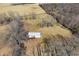 Aerial view of a detached outbuilding, set in a landscape of trees and a grassy yard at 1125 S Buffalo Hill Rd, Martinsville, IN 46151