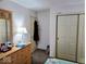 This bedroom shows neutral paint and plenty of storage at 11521 Coastal Dr, Indianapolis, IN 46229
