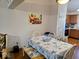 Bright dining area with table, chairs, and a view into the kitchen at 11521 Coastal Dr, Indianapolis, IN 46229