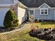 Charming home featuring well-maintained landscaping and inviting front entrance at 11521 Coastal Dr, Indianapolis, IN 46229