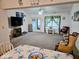 Open concept living room, dining area and kitchen with nice natural lighting at 11521 Coastal Dr, Indianapolis, IN 46229