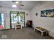 Bright living area with vaulted ceilings, ceiling fan and lots of natural light at 11521 Coastal Dr, Indianapolis, IN 46229