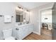 Bright bathroom featuring a double sink vanity, modern fixtures, and neutral finishes at 1234 S Talbott St, Indianapolis, IN 46225