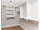 Walk-in closet featuring custom shelves and hanging racks for optimal storage and organization at 1234 S Talbott St, Indianapolis, IN 46225