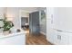 Bright laundry room with white cabinets and a convenient folding area at 1234 S Talbott St, Indianapolis, IN 46225