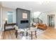 Stylish living room with a modern fireplace, hardwood floors, and contemporary decor at 1234 S Talbott St, Indianapolis, IN 46225