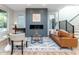 Chic living room featuring a sleek fireplace, elegant seating, and a bright, airy ambiance at 1234 S Talbott St, Indianapolis, IN 46225