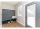 Practical mudroom with storage bench, coat hooks, and plenty of natural light at 1234 S Talbott St, Indianapolis, IN 46225