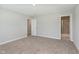 Spacious bedroom with neutral walls and plush carpeting, offering versatility and comfort at 1274 Newton St, Avon, IN 46123