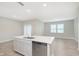Bright kitchen features a large island with stainless steel appliances and ample counter space at 1274 Newton St, Avon, IN 46123