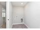 Clean laundry room with tile floors, utility connections, and a bright, functional space at 1274 Newton St, Avon, IN 46123