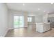 Bright and airy living room featuring modern floors, recessed lighting, and lots of natural light at 1274 Newton St, Avon, IN 46123