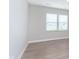 Bright living room area featuring natural light and modern flooring, creating an inviting ambiance at 1274 Newton St, Avon, IN 46123