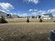 A wide angle landscape view of the lovely neighborhood on a sunny day at 1274 Newton St, Avon, IN 46123