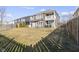 Fenced yard with swing set, patio and lush green lawn provides ample outdoor space at 1299 Timber Bluff Rd, Westfield, IN 46074