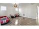 Bright and airy bonus room featuring hardwood floors and a fun play area at 1299 Timber Bluff Rd, Westfield, IN 46074