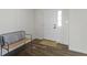 Entryway featuring hardwood floors, a bench, and a view of the front door at 1299 Timber Bluff Rd, Westfield, IN 46074