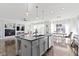 Kitchen featuring an island with a sink, stainless steel appliances and modern countertops at 1299 Timber Bluff Rd, Westfield, IN 46074