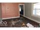 Interior room with damaged walls and floors at 1310 E 5Th St, Muncie, IN 47302