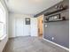Nicely carpeted bedroom with access to another room at 1381 Delacorte Cir, Shelbyville, IN 46176