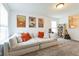 Upstairs bonus room featuring decor and comfortable seating, perfect for entertaining friends and Gathering at 1381 Delacorte Cir, Shelbyville, IN 46176