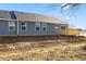 Backyard of home features a new deck and grading in preparation for landscaping at 140 Mission Terrace Dr, Whiteland, IN 46184