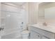 Bright bathroom featuring a shower-tub combo, a white vanity, and a large mirror over the sink at 140 Mission Terrace Dr, Whiteland, IN 46184