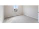 Neutral bedroom with plush carpeting, a window providing natural light, and crisp white trim at 140 Mission Terrace Dr, Whiteland, IN 46184