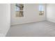 Carpeted bedroom featuring two windows at 140 Mission Terrace Dr, Whiteland, IN 46184