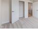 Bedroom featuring a carpeted floor, neutral walls, white trim, and closet with wire shelving at 140 Mission Terrace Dr, Whiteland, IN 46184