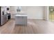 Kitchen featuring stainless steel appliances, an island and hardwood flooring at 140 Mission Terrace Dr, Whiteland, IN 46184