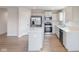 Kitchen featuring stainless steel appliances, an island and hardwood flooring at 140 Mission Terrace Dr, Whiteland, IN 46184