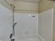 Bathroom featuring shower and tub combo with white tiling at 14457 Orange Blossom Trl, Fishers, IN 46038