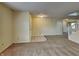 Inviting living room with neutral walls, plush carpeting and tile entry at 14457 Orange Blossom Trl, Fishers, IN 46038