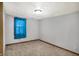 Cozy bedroom with natural light streaming through the single window at 1529 Bailey Dr, Indianapolis, IN 46241