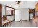 View of kitchen including a refrigerator, with wood countertop and a view to the Living Room at 1529 Bailey Dr, Indianapolis, IN 46241